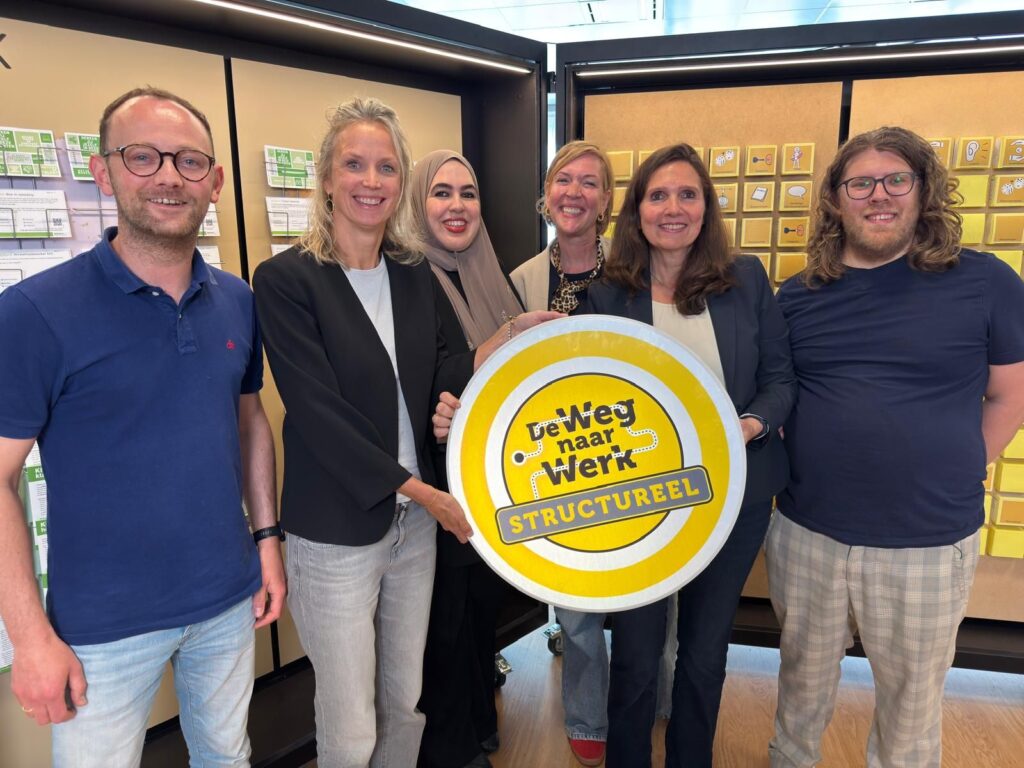 Overhandiging verkeersbord De weg naar Werk